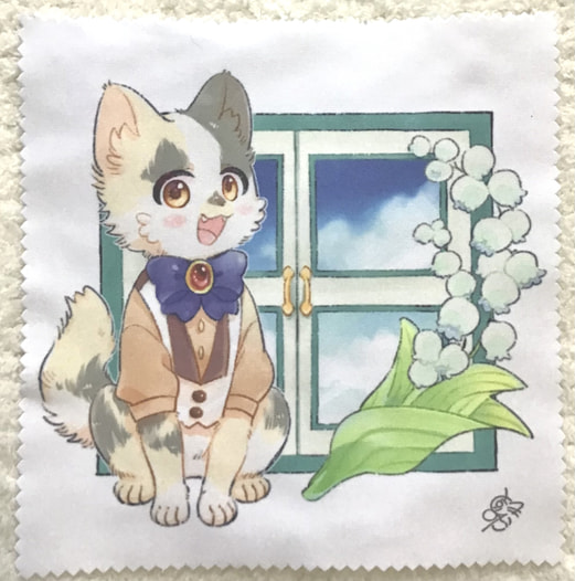 窓と猫昼めがねふき