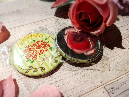 花貌の悪魔缶ミラー(ノア)